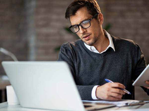 Man at home on his laptop